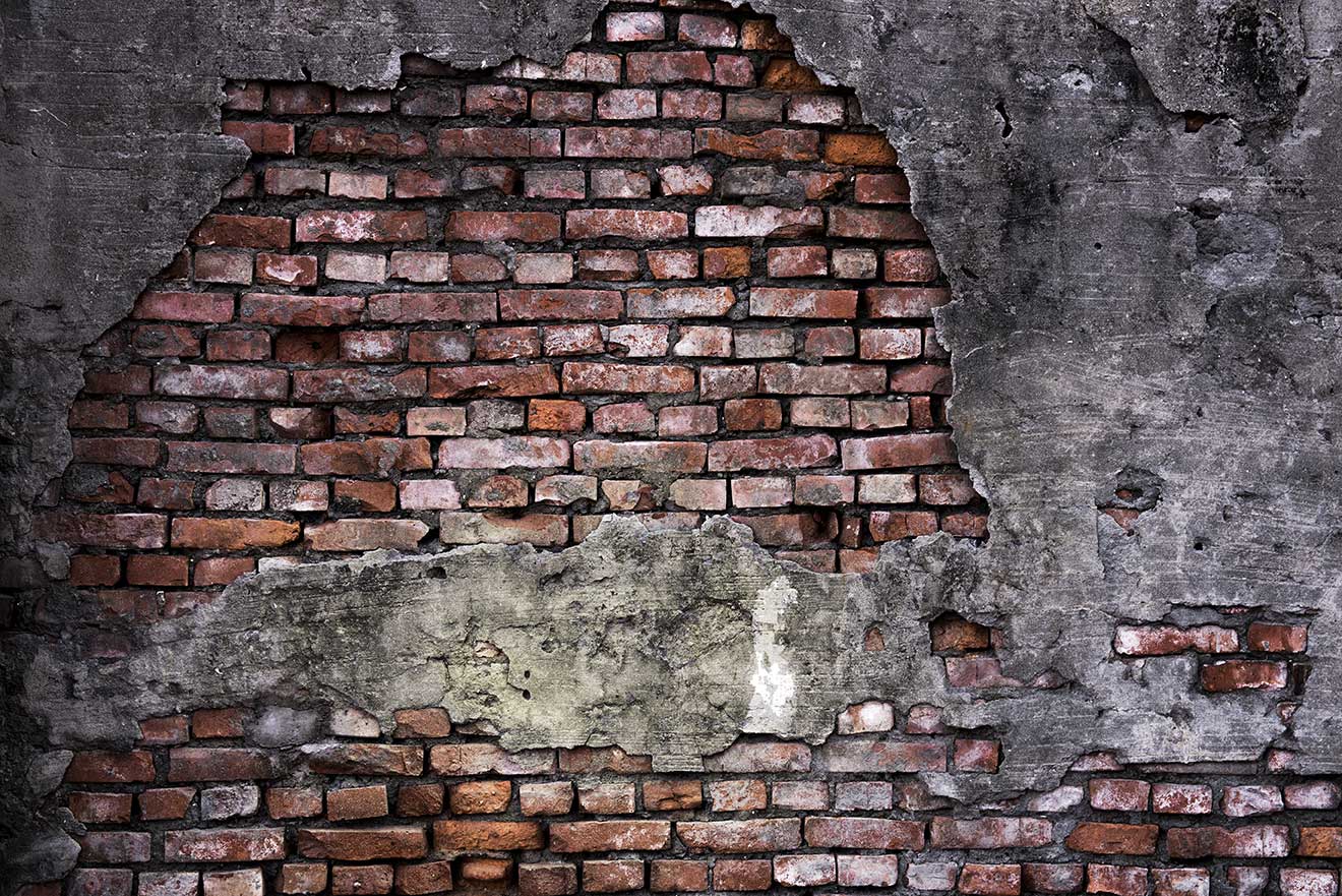 Kapotte bakstenen muur